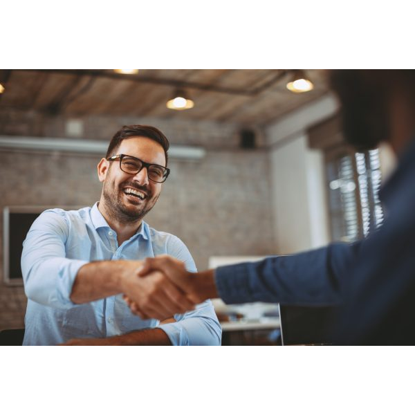 Happy Man Shaking Hands with Someone