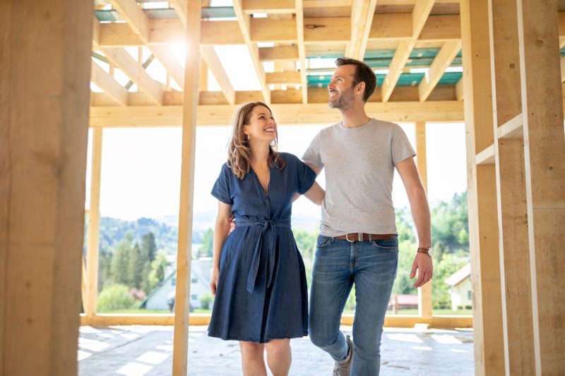 Couple Inside Construction Home