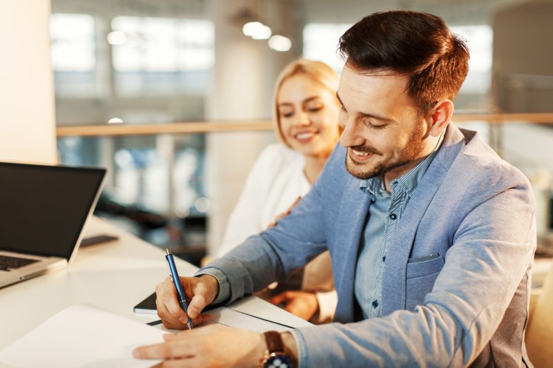 Home Owners Signing a Contract