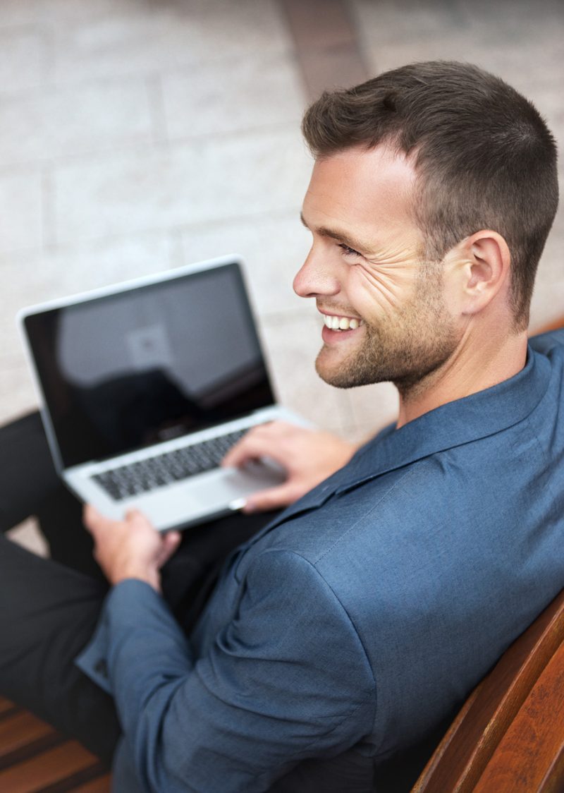 Handsome Man with Laptop