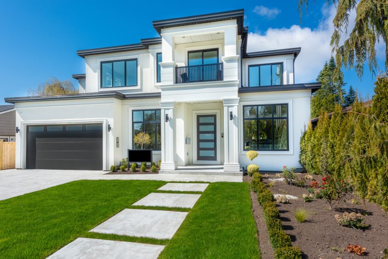 Gray and Blue House with Yard