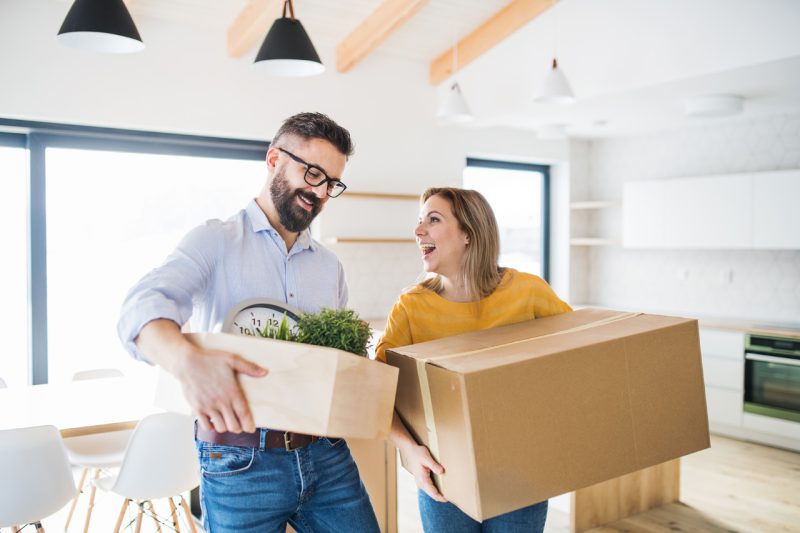 Happy Couple Moving Out