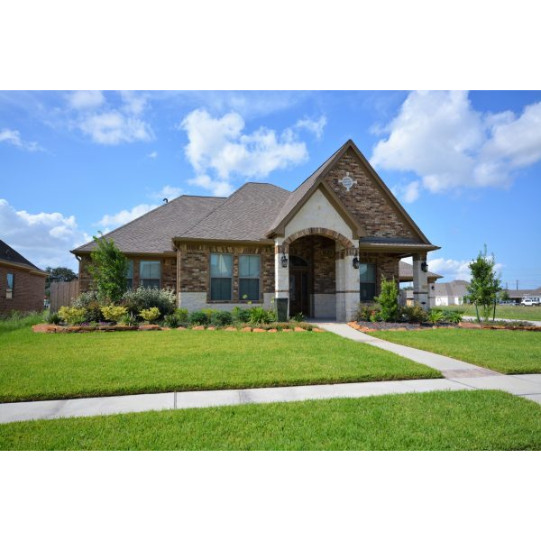 Beautiful Brown House with Front Lawn