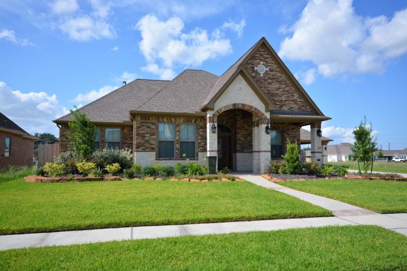 Beautiful Brown House with Front Lawn