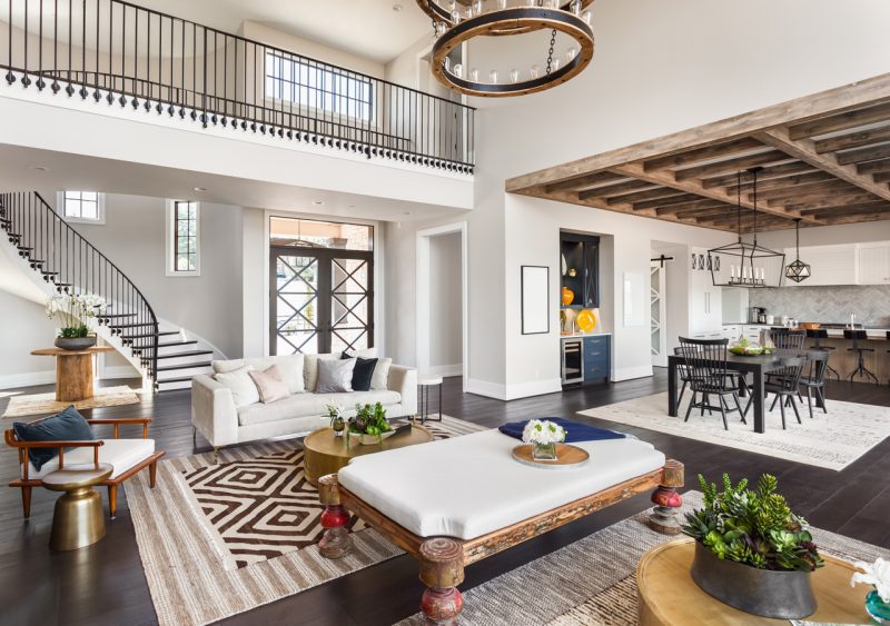 Inside Living Room Space and Kitchen View with Stairs