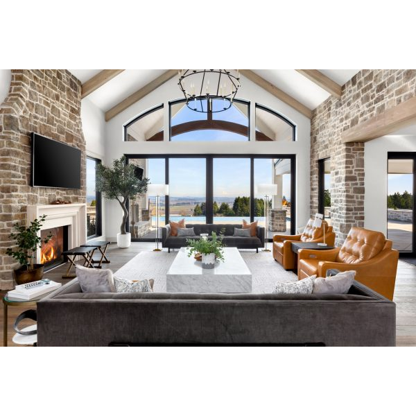 Luxury Living Room Space with Pool View and Fireplace