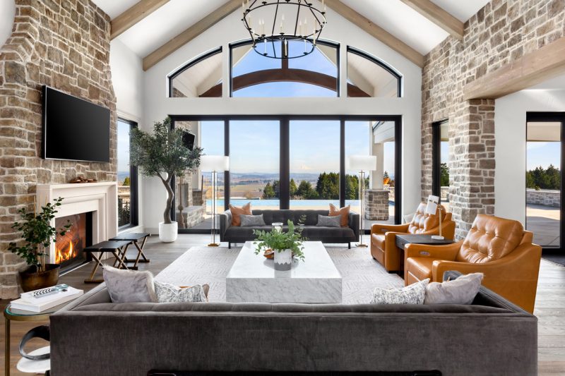 Luxury Living Room Space with Pool View and Fireplace