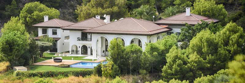 House with a Pool Surrounded by Trees