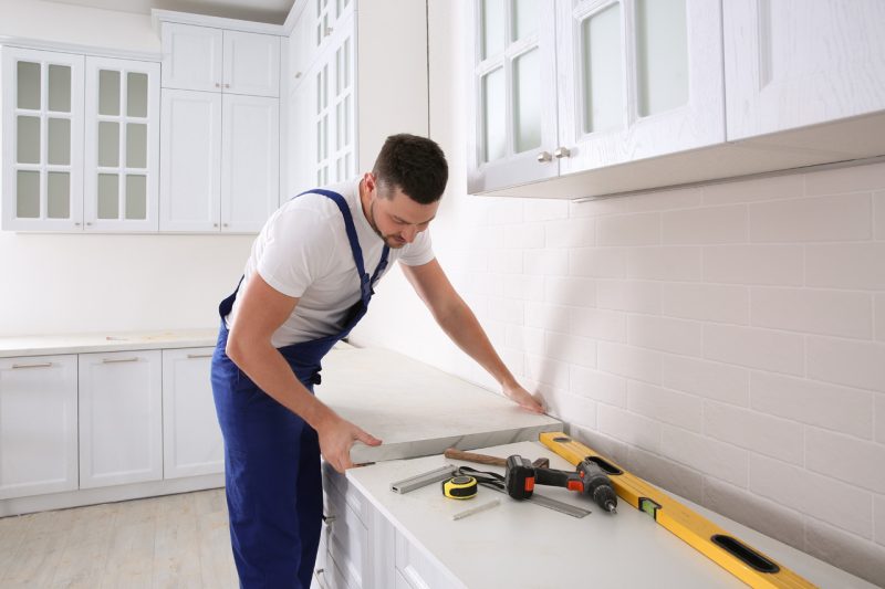 Man Restoring a Kitchen