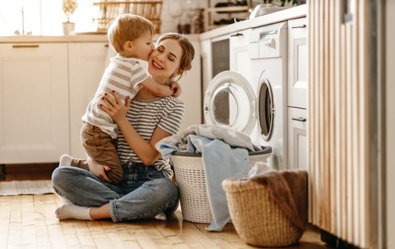 Mother and Son Doing Laundry