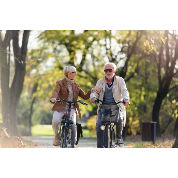 Old Couple Ridding Bikes