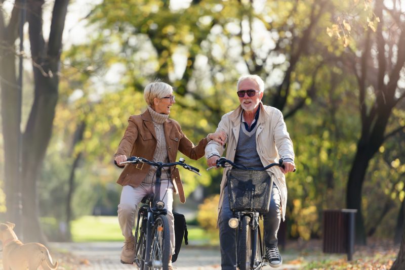 Old Couple Ridding Bikes