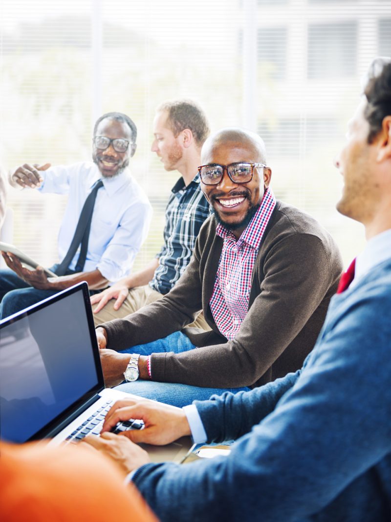 Smiling Executive Men Enjoying Work