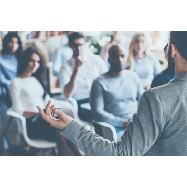 Business Man Giving a Talk to the Audience