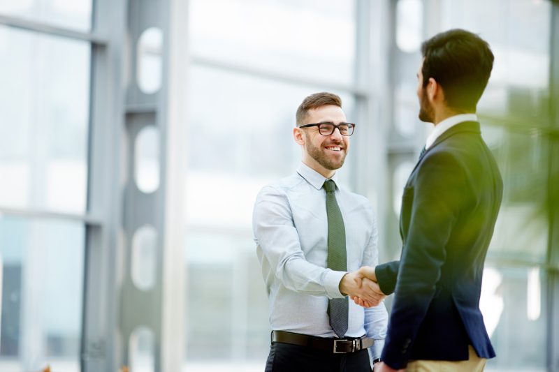 Men Shaking Hands Closing a Deal