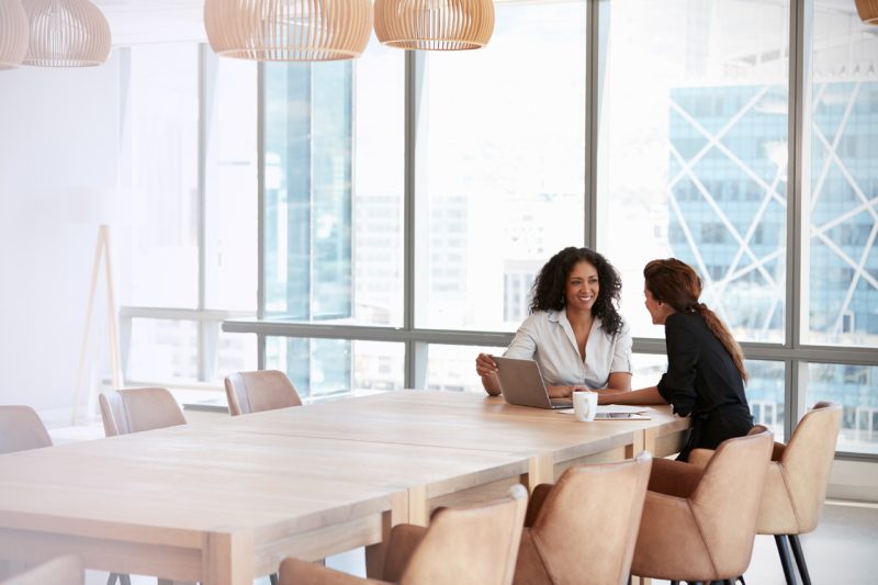 Two Woman Working in an Meeting Room in the City