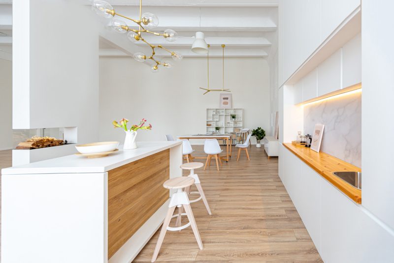 White Kitchen Bar with Fire Place and Dining Room