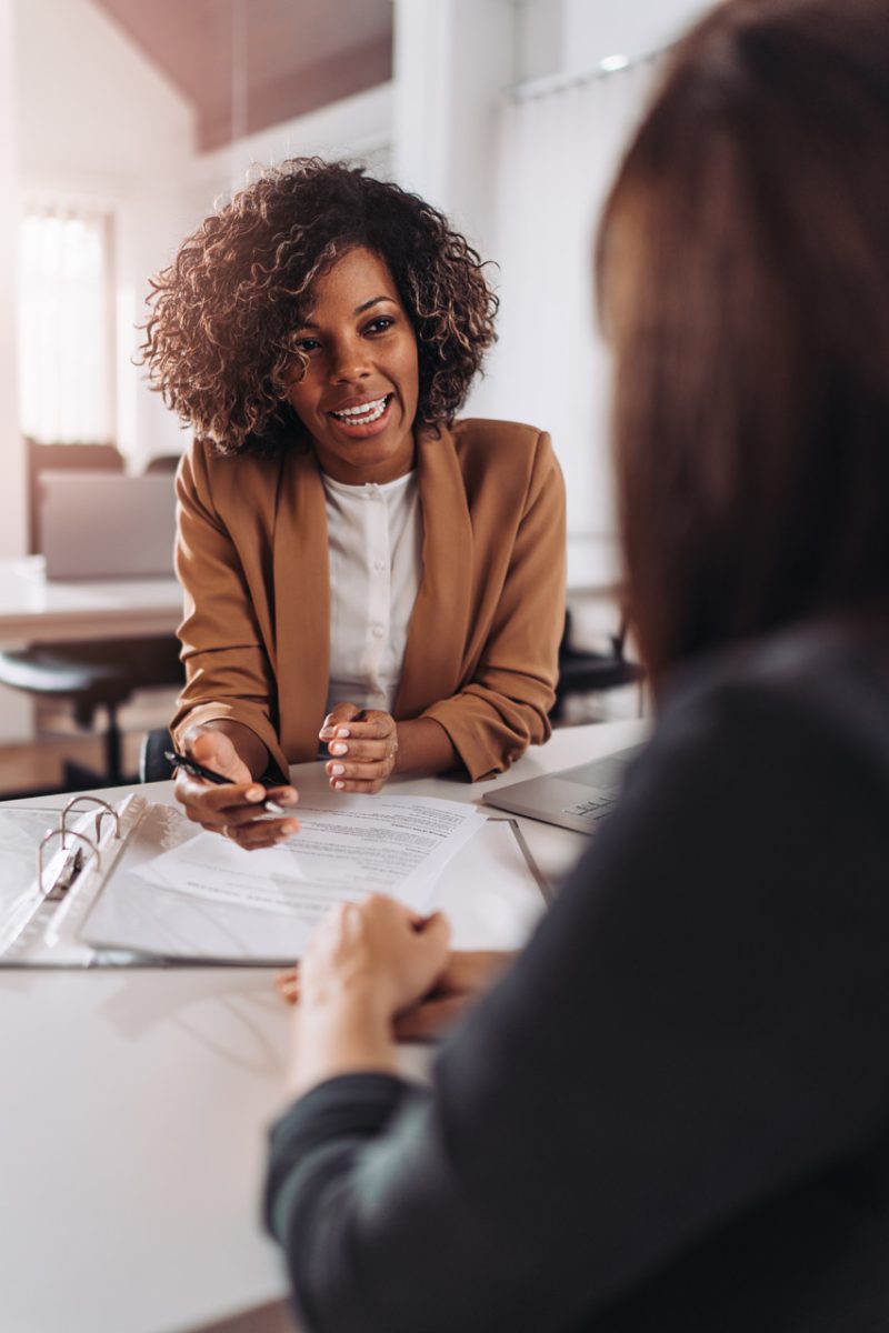 Woman Broker Explaining