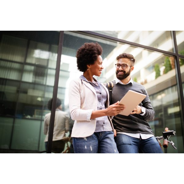 Woman and Man Outside a Building