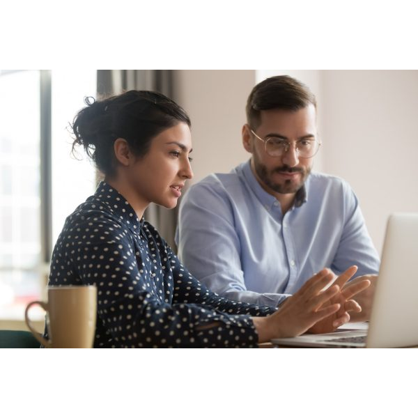 Woman and Man Working with Laptop