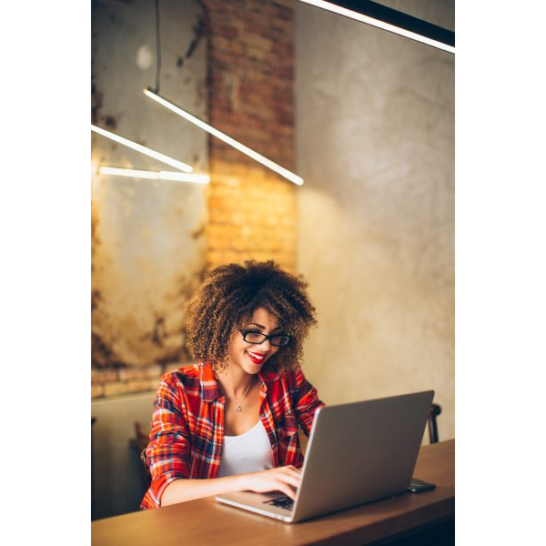 Young Woman Working on Laptop